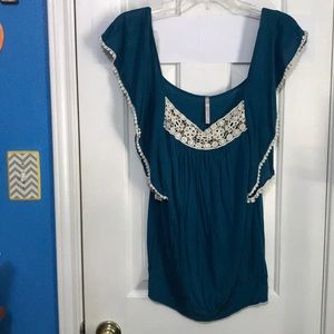 Teal shirt with lace accent